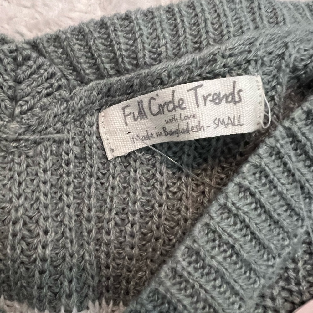 Woman’s small crop sweater brand new with tags.